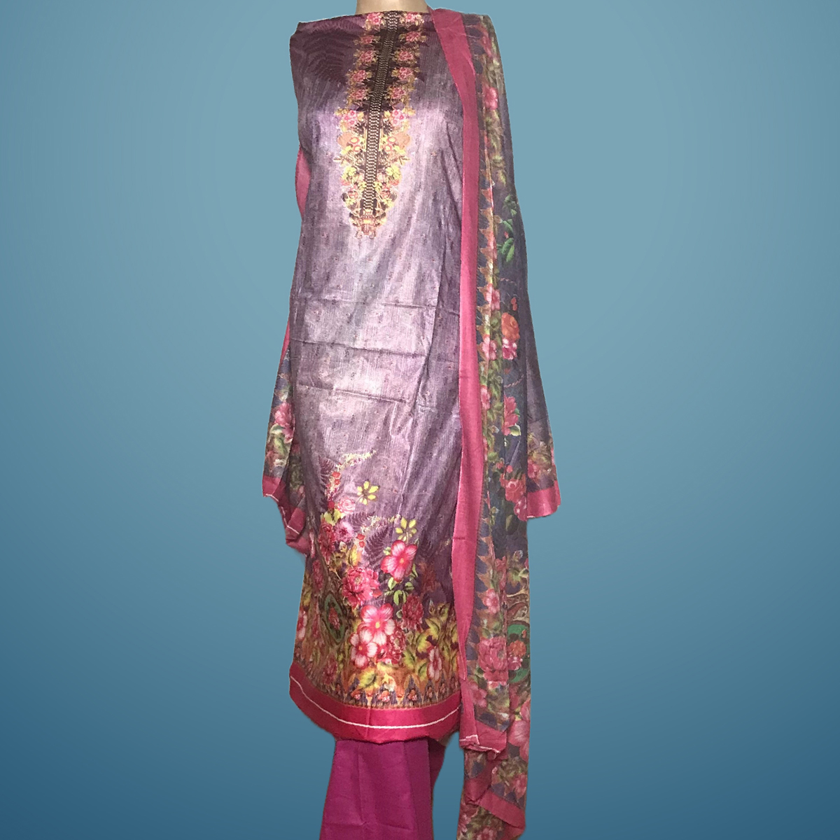 Lavender Cotton Salwar Kameez- Noborong Lavender Cotton Salwar Kameez This relaxed and comfy lavender cotton printed kamiz set with pants and large dupatta, perfect for casual summer days at home. Vibrant design, soft fabric, and versatile style.
